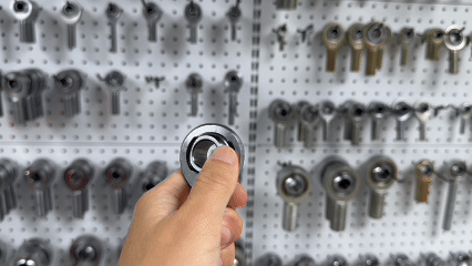 rodendtorquef2resistance SYZ Rod Ends GIF of a rod end where the ball is rotated with the thumb, showing noticeable resistance typical of F2 torque level