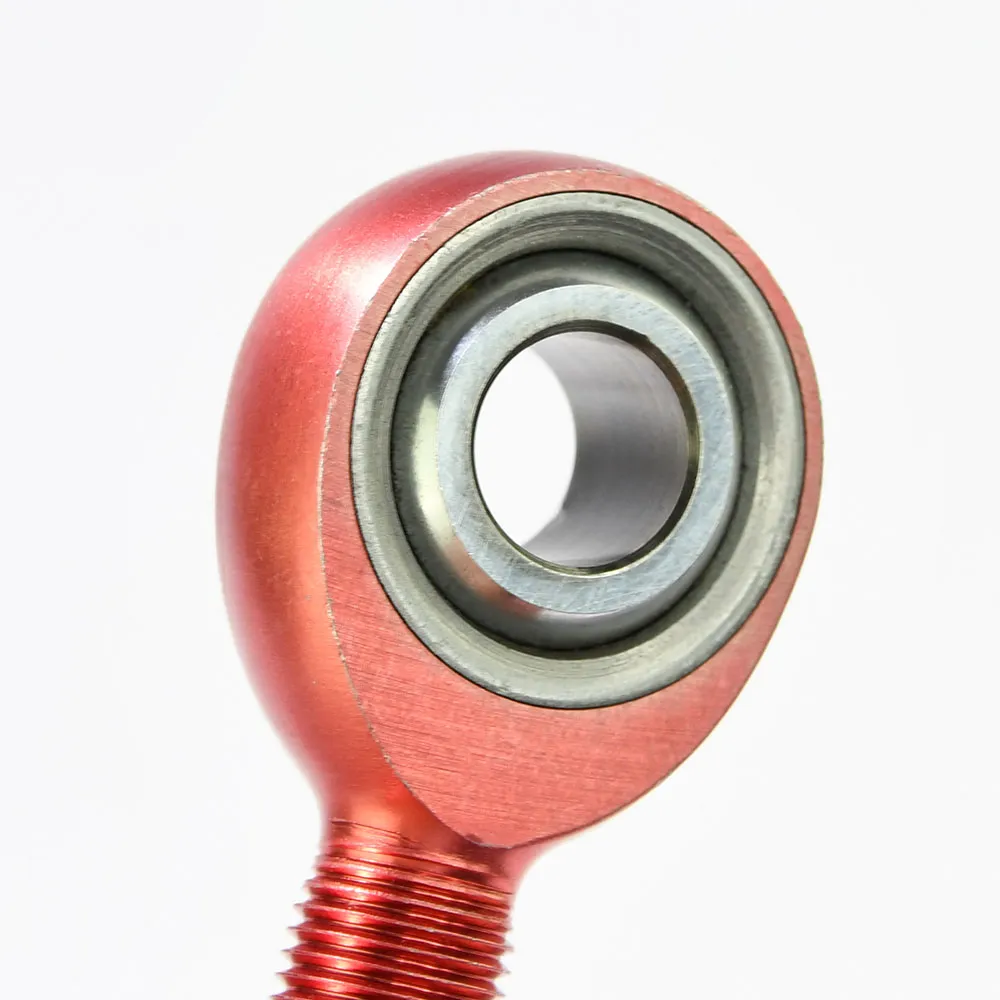 Close-up of red anodized ALJM aluminum rod end